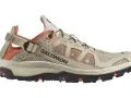A beige and orange Salomon Techamphibian 5 sandal-shoe hybrid with a mesh upper and Contagrip sole, perfect for amphibious adventures.