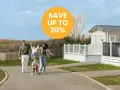 Family enjoys a sunny day near mobile homes, perfect for location de mobil-homes pas cher. Save up to 20%!