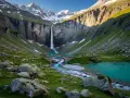 A breathtaking view of a waterfall cascading into a turquoise lake, with a stone bridge crossing a stream. This scene evokes the feeling of hiking in the Pyrenees, France, surrounded by majestic mountains and lush green slopes.
