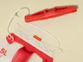 An Osprey 2.5L hydration pack with a red bite valve and a clear opening. This hydration pack is perfect for staying hydrated on the go.