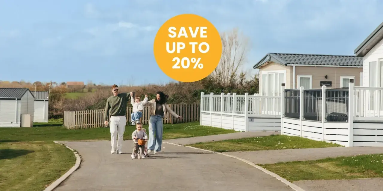 Family enjoys a sunny day near mobile homes, perfect for location de mobil-homes pas cher. Save up to 20%!