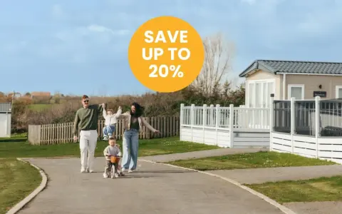 Family enjoys a sunny day near mobile homes, perfect for location de mobil-homes pas cher. Save up to 20%!