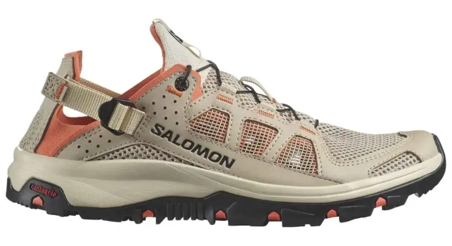 A beige and orange Salomon Techamphibian 5 sandal-shoe hybrid with a mesh upper and Contagrip sole, perfect for amphibious adventures.